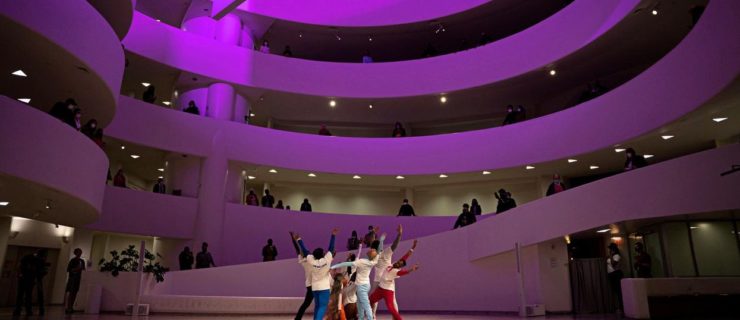 Dancers gather in the center of the Guggenheim's rotunda
