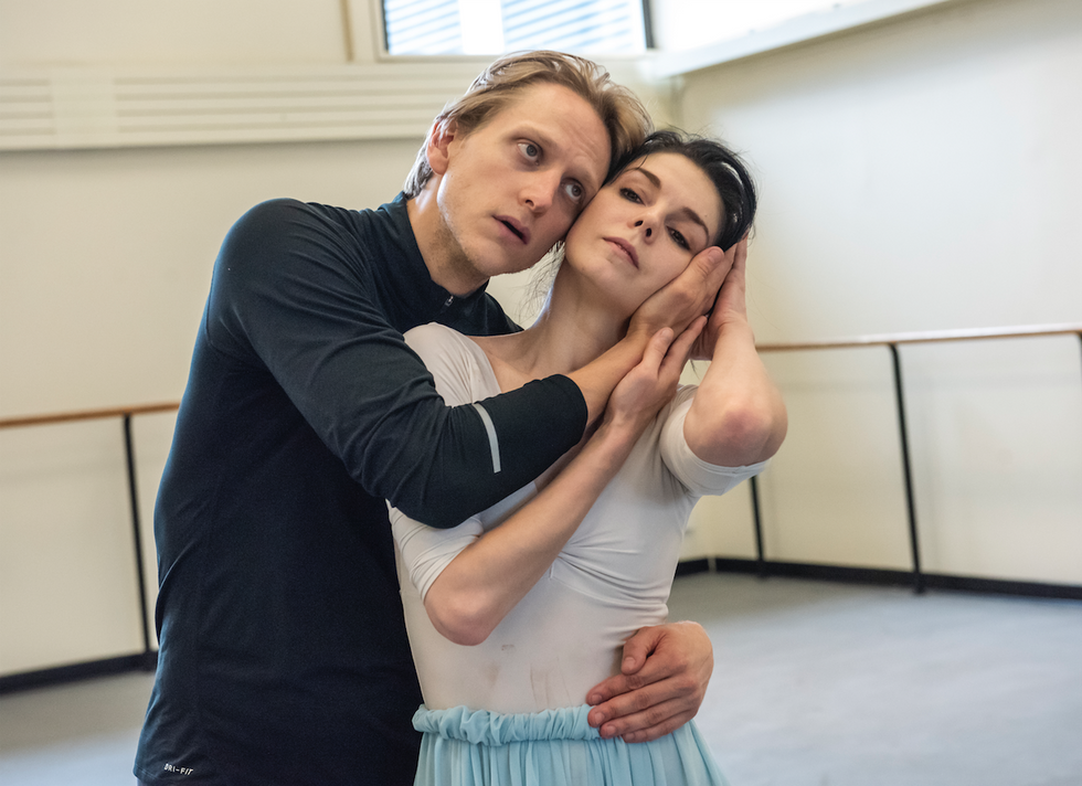 David Hallberg cradles Natalia Osipva's head in his hands in this dramatic closeup