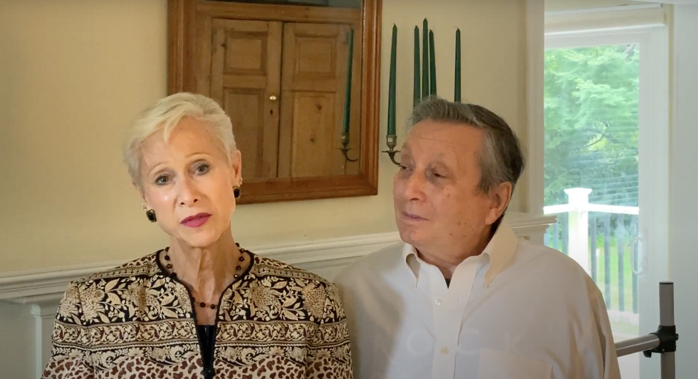 A screenshot of Bo and Stephanie Spassoff's acceptance speech, filmed in their home