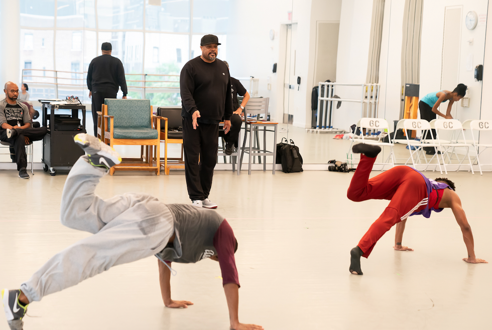 Rennie Harris corrects two Ailey dancers.