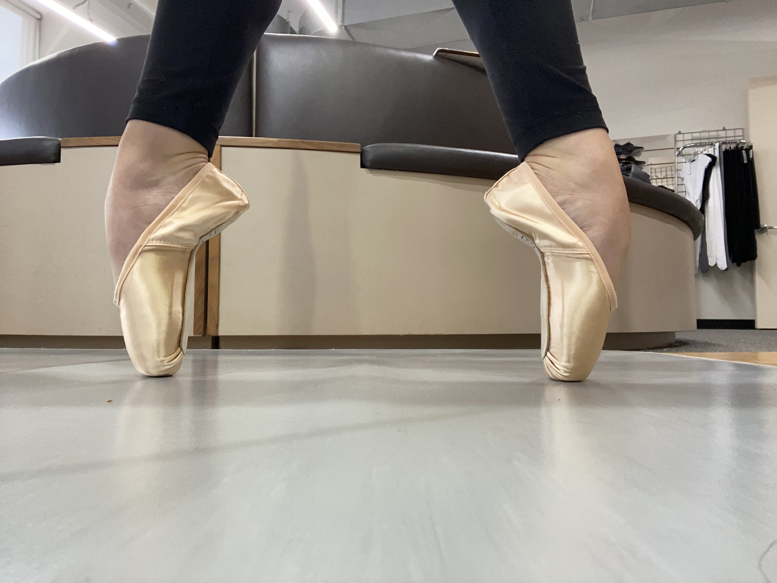 Two feet stand on pointe in second positon