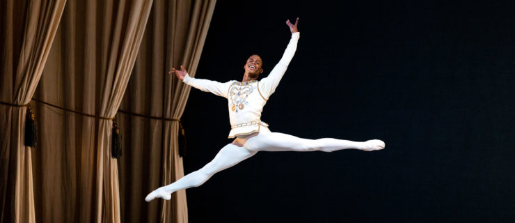male dancer performing a grand jete
