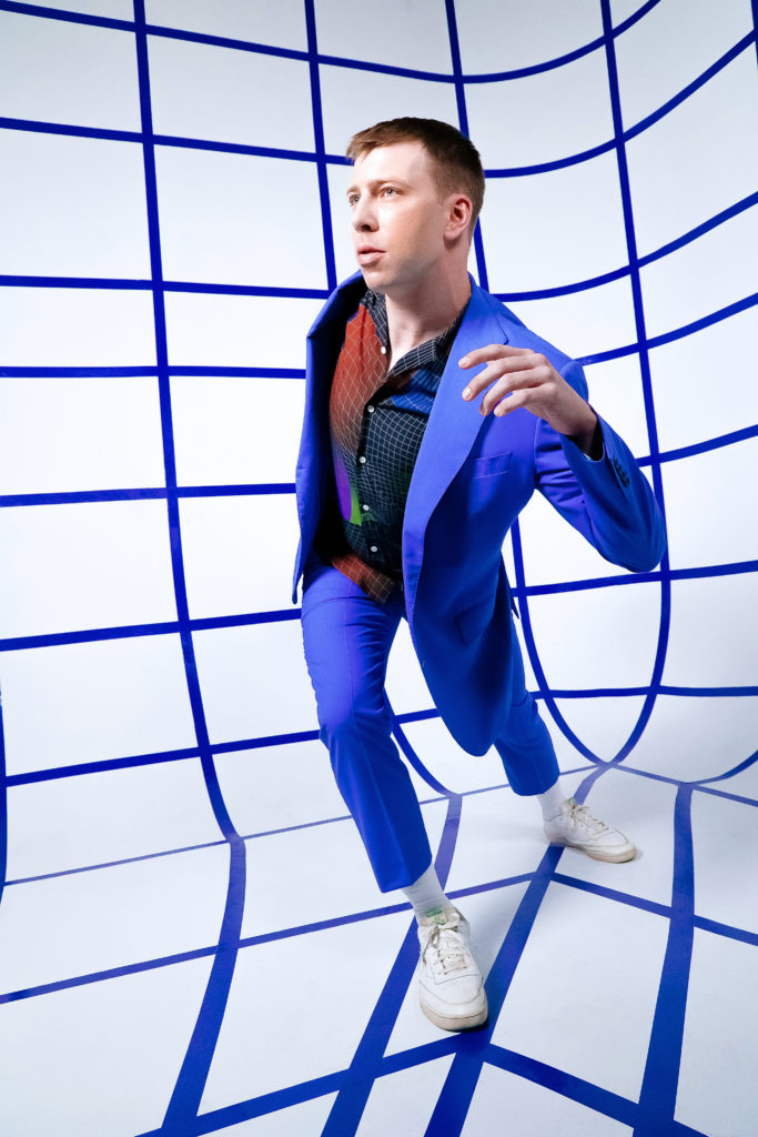 male dancer wearing blue suit 