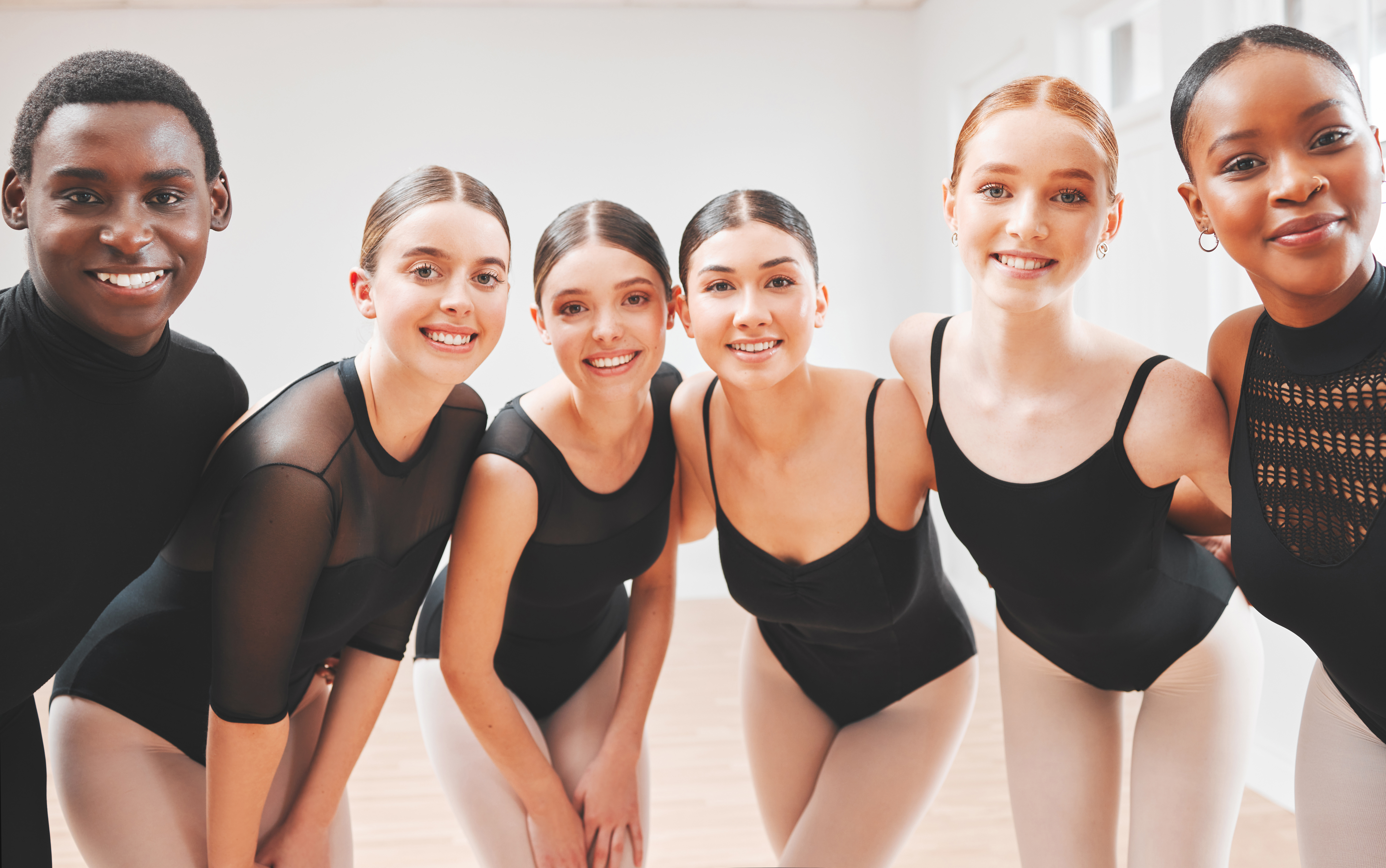 Shot of a group of ballet dancers standing together