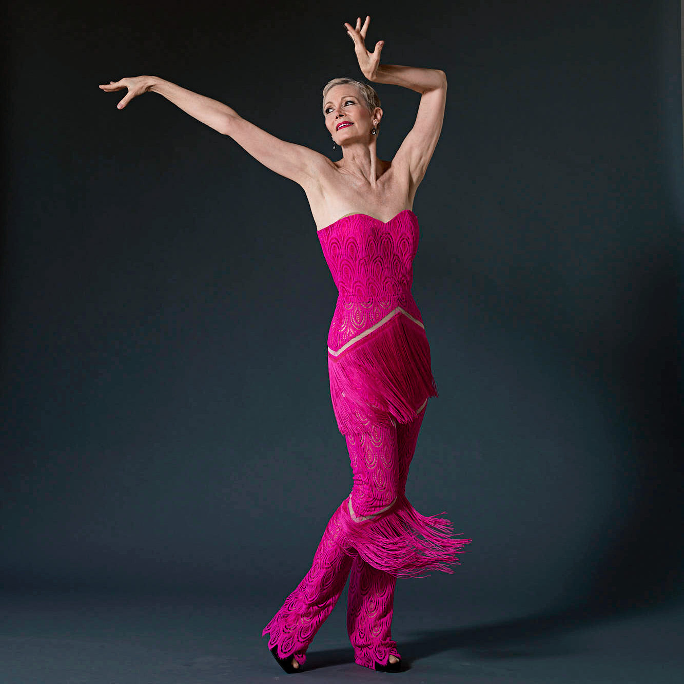 female dancer wearing hot pink body suit