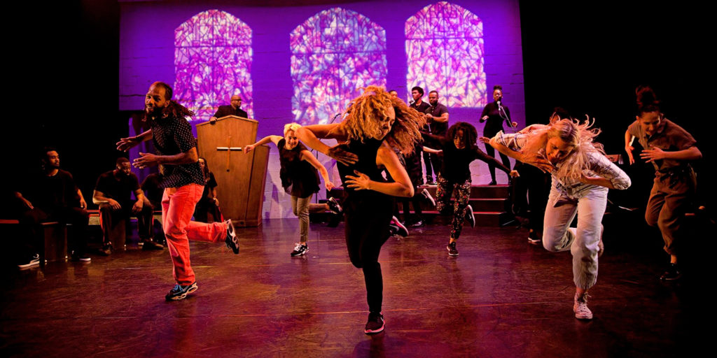 group of steppers performing with a live band