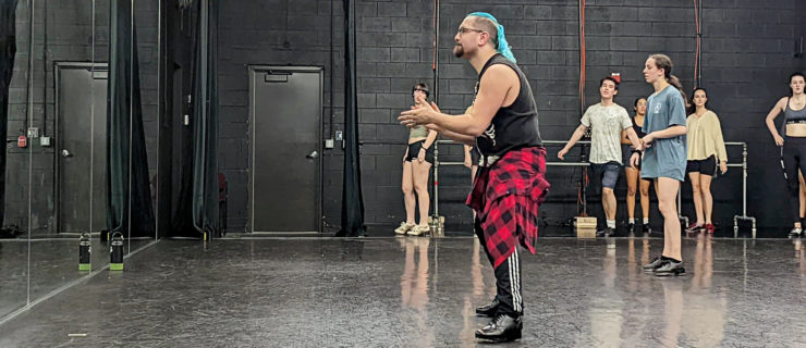 male instructor teaching tap class