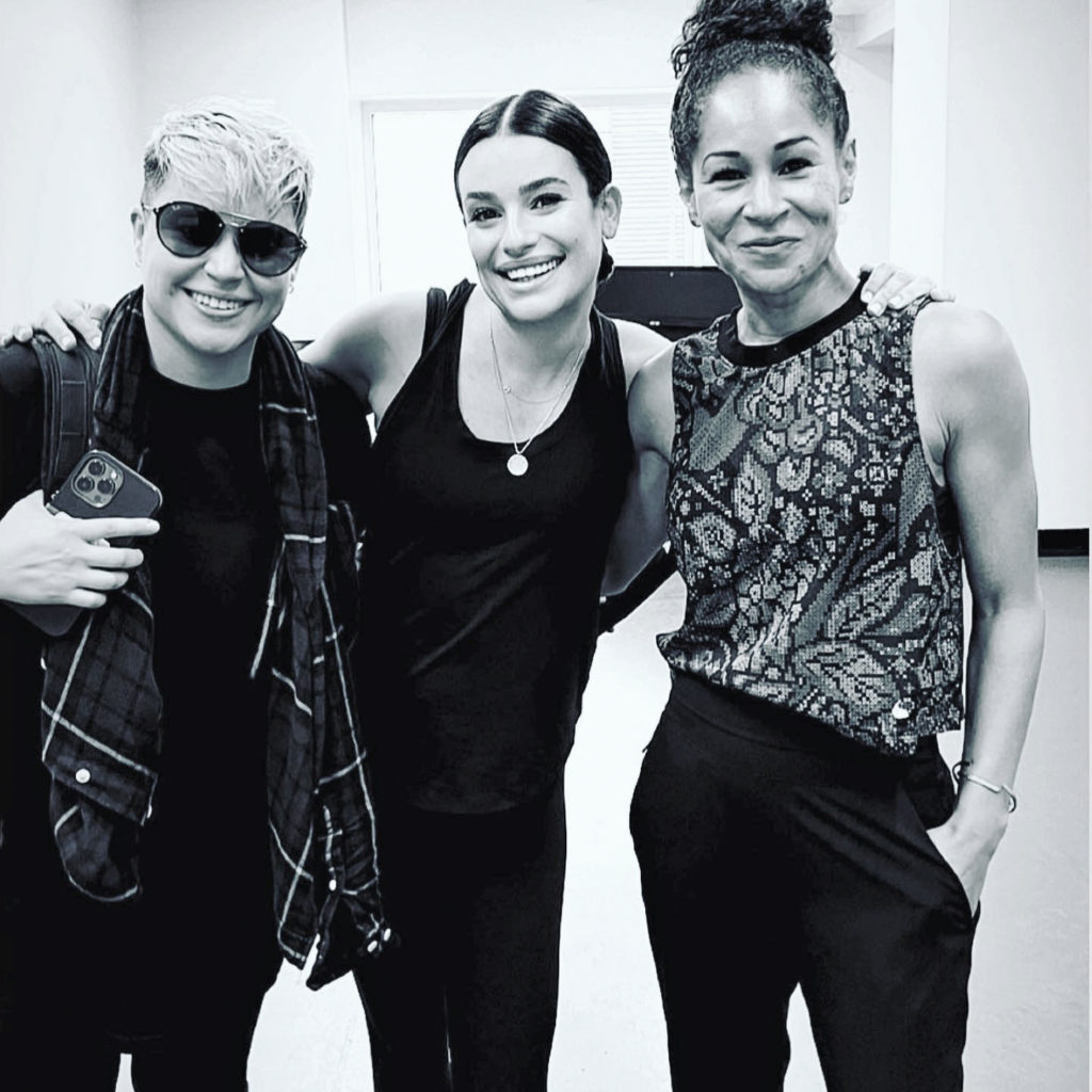 3 females smiling at the camera 