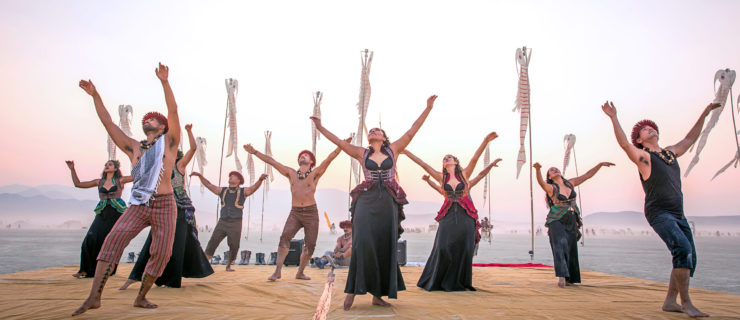 group of hula dancers on the beach
