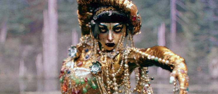 dancer wearing gold and heavy jewelry