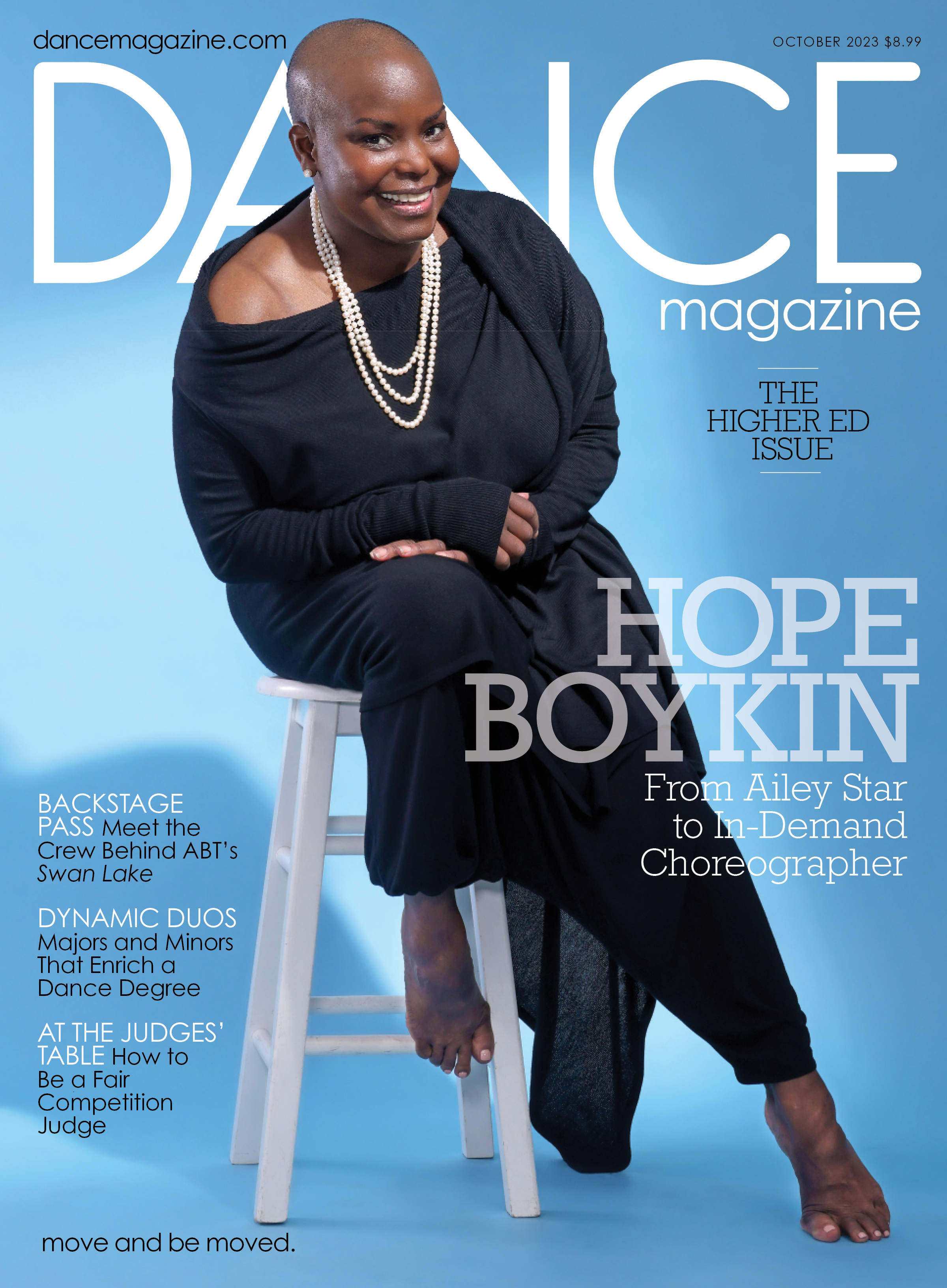 The cover of the October 2023 issue of Dance Magazine. Hope Boykin, a petite, curvy Black woman with a shaved head, smiles warmly at the viewer as she perches on a white stool, leaning forward as though letting you in on a joke. Her black dress drapes elegantly around her and to the floor as she outstretches an arched foot. The largest cover line reads, "Hope Boykin: From Ailey Star to In-Demand Choreographer."