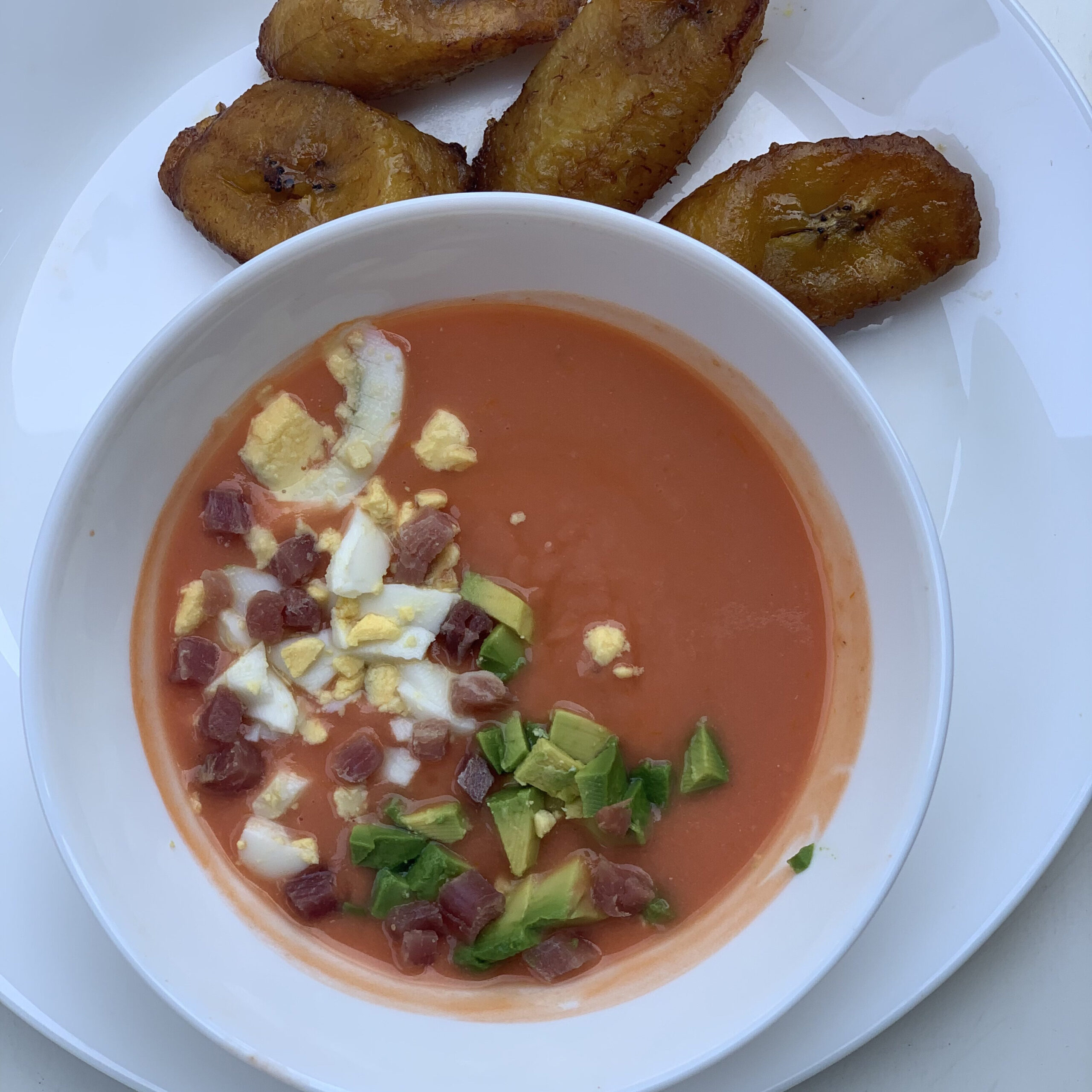 a bowl of soup with toppings 