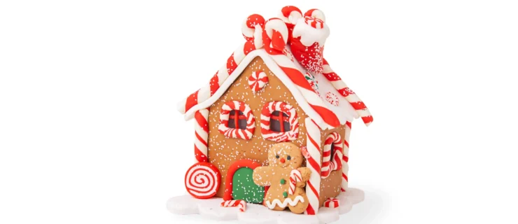 A gingerbread house against a blank white background.