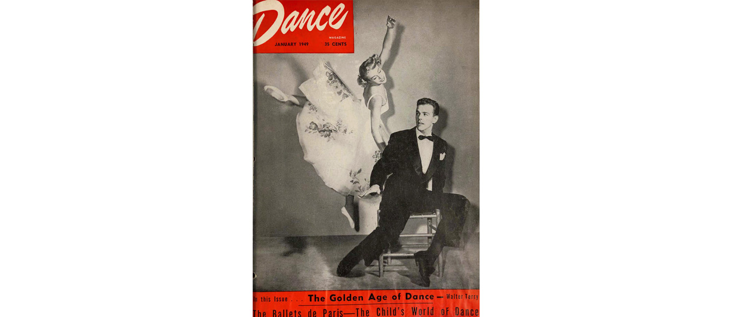 The cover of the January 1949 issue of Dance Magazine. In a black and white image, Gower Champion is seated in a tuxedo, seeming ready to leap to his feet as he glances over his shoulder at Marge Champion. Marge wears a flowing dress that flares around her as she jumps in back attitude, gaze directed down to Gower below her.